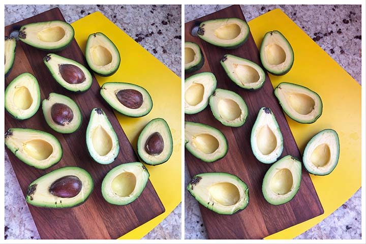 ripe avocados split and deseeded on a yellow cutting board.