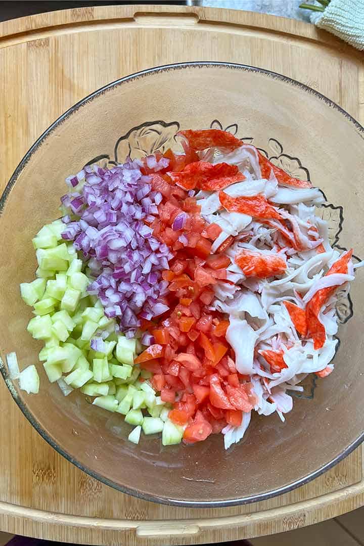 Ingredients-in-crab-ceviche-cored-Tomato-Cucumber-and-Red-Onion-in-large-bowl.