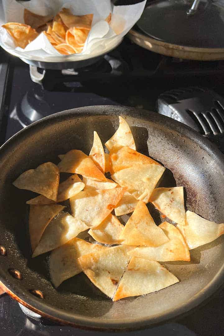 Process step of frying tortillas in frying.