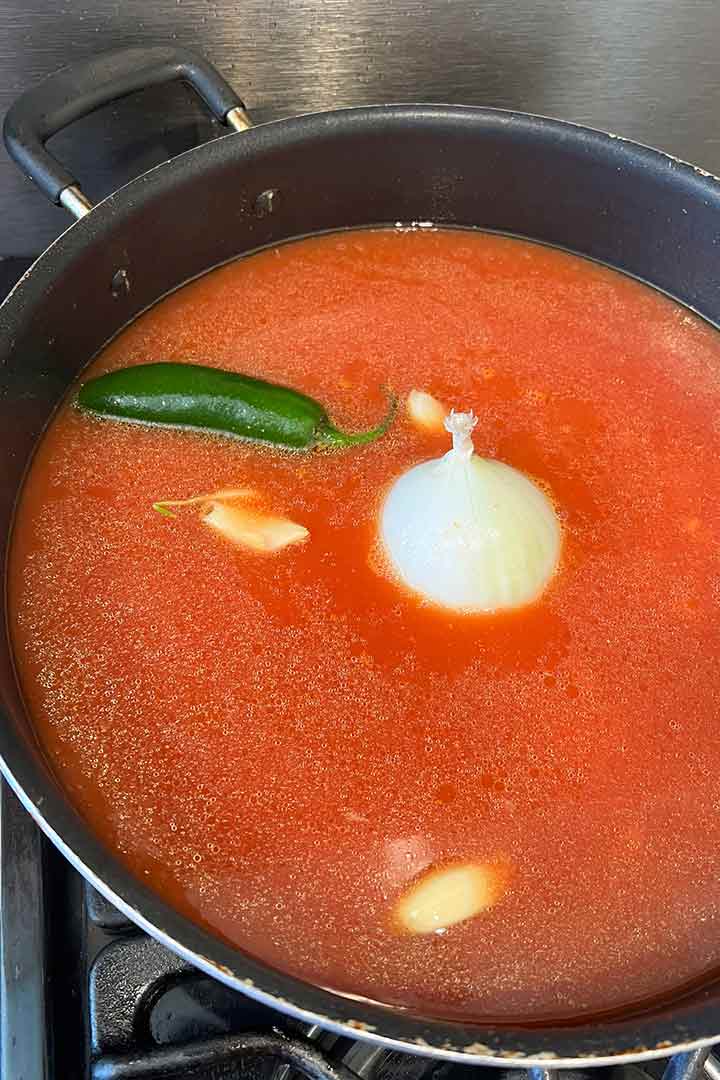 all ingredients in large pot before cooking rice recipe.