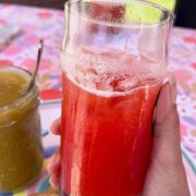 Strawberry Lime Agua Fresca recipe in a glass with ice post 1.