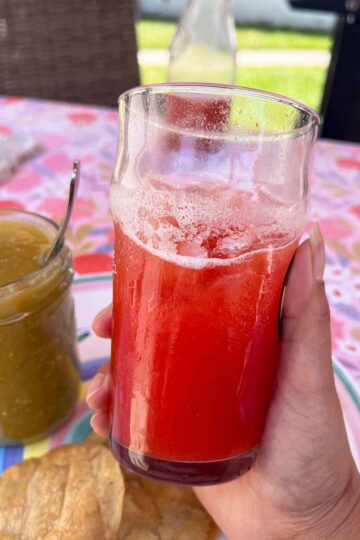 Strawberry Lime Agua Fresca recipe in a glass with ice post 1.